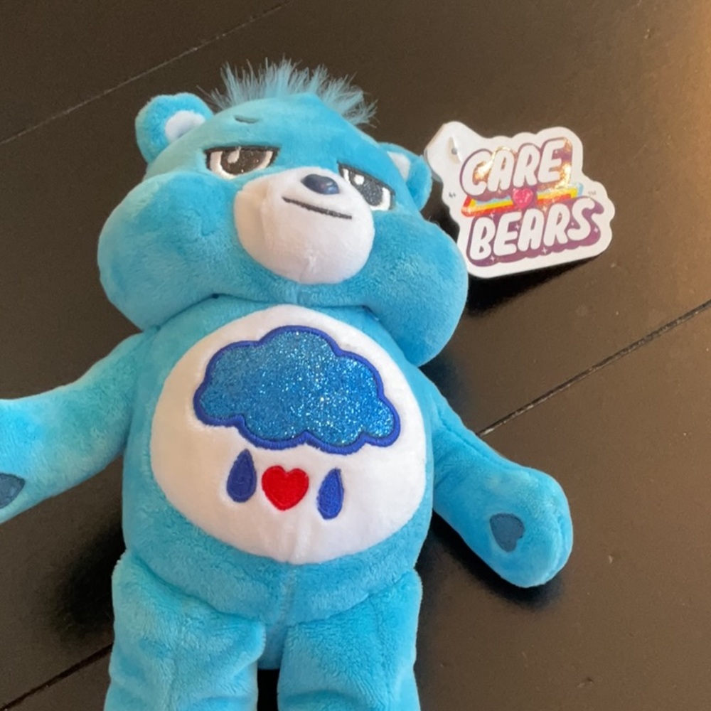 It is a care bear who is grumpy bear.